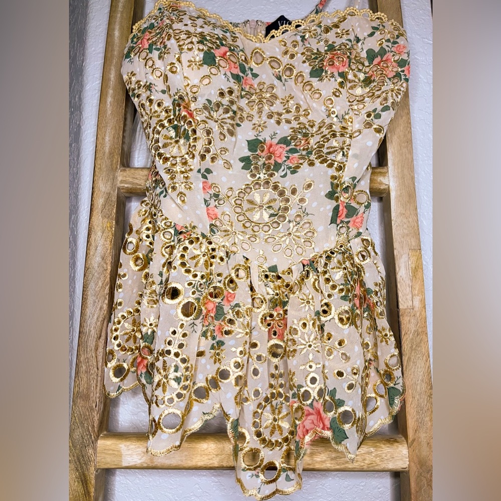 Gorgeous floral corset style peplum top!